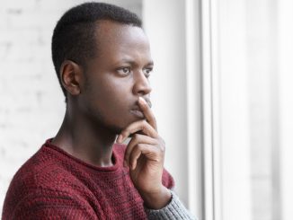 "I Am 20, HIV Positive, And Scared Of What Will Happen When The Pills Run Out" 5 19458801 pensiveworriedafricanamericanartdirectordressedcasuallykeepingfingerlips jpeg20d71aa3f31a554f505077b706ab9b1d